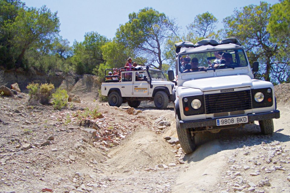 Jeeps exploring rocky trails in Ibiza