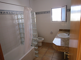 Bathroom with bath in a rental house of Ibiza