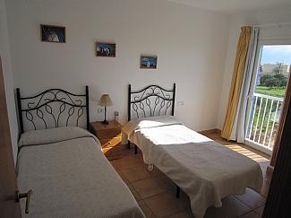 Room with two single beds