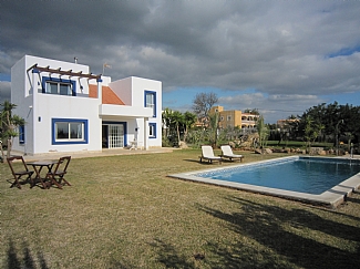 general view of a rental house with pool zone in ibiza