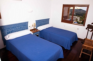 two single beds room in a house of Ibiza