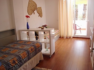 two single beds room in a house of Ibiza