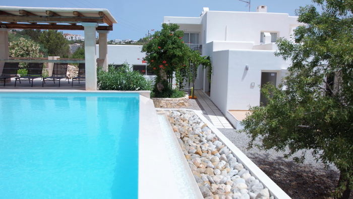 general view of  the pool zone of a rental house in ibiza