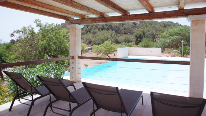 General view of the pool zone in a rental house of Ibiza