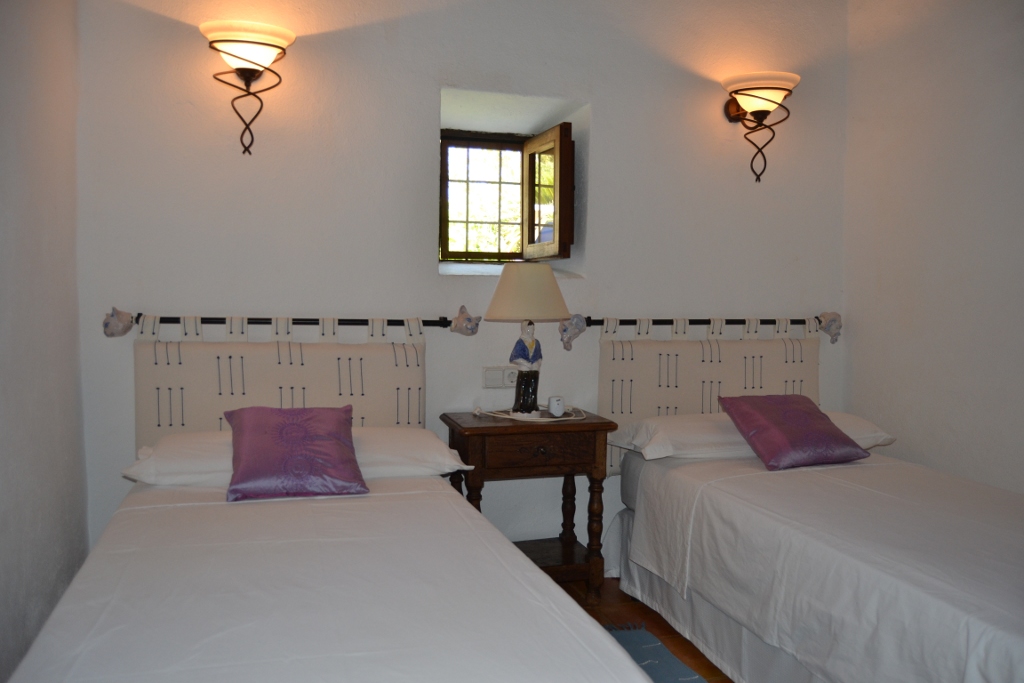 Room with two single beds